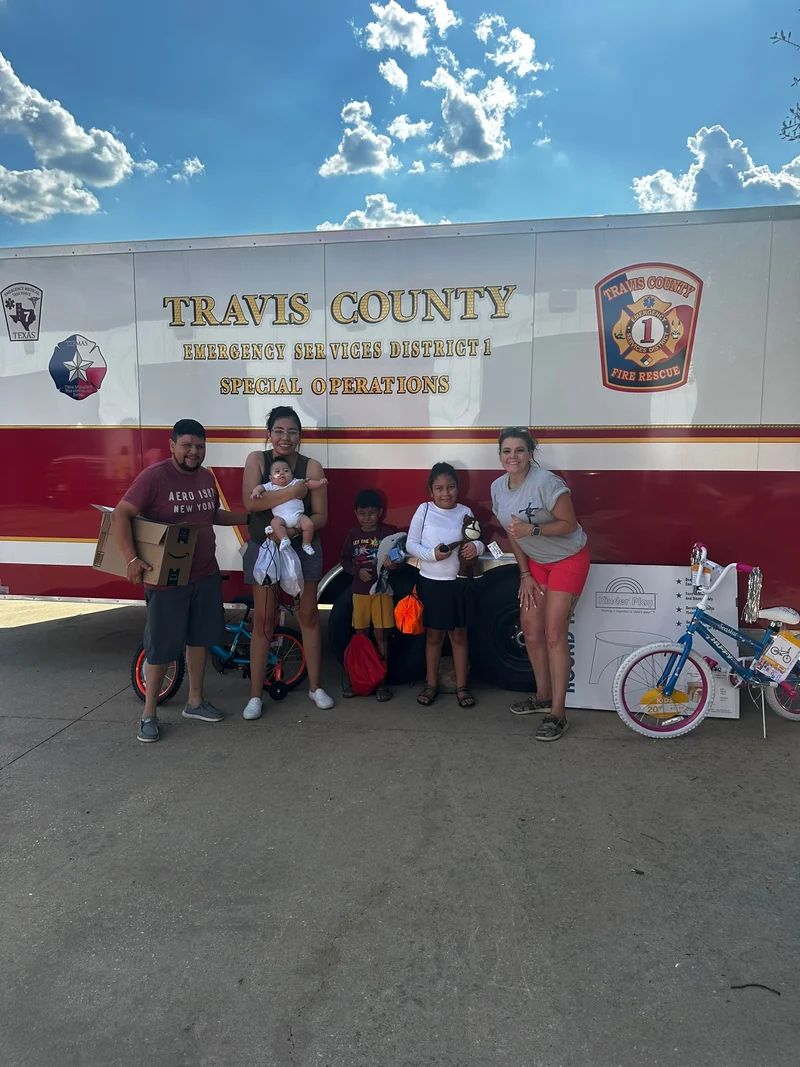 TXfloods SandyCreek ToyDrive DisasterRelief BigHappyFamily poses for donors