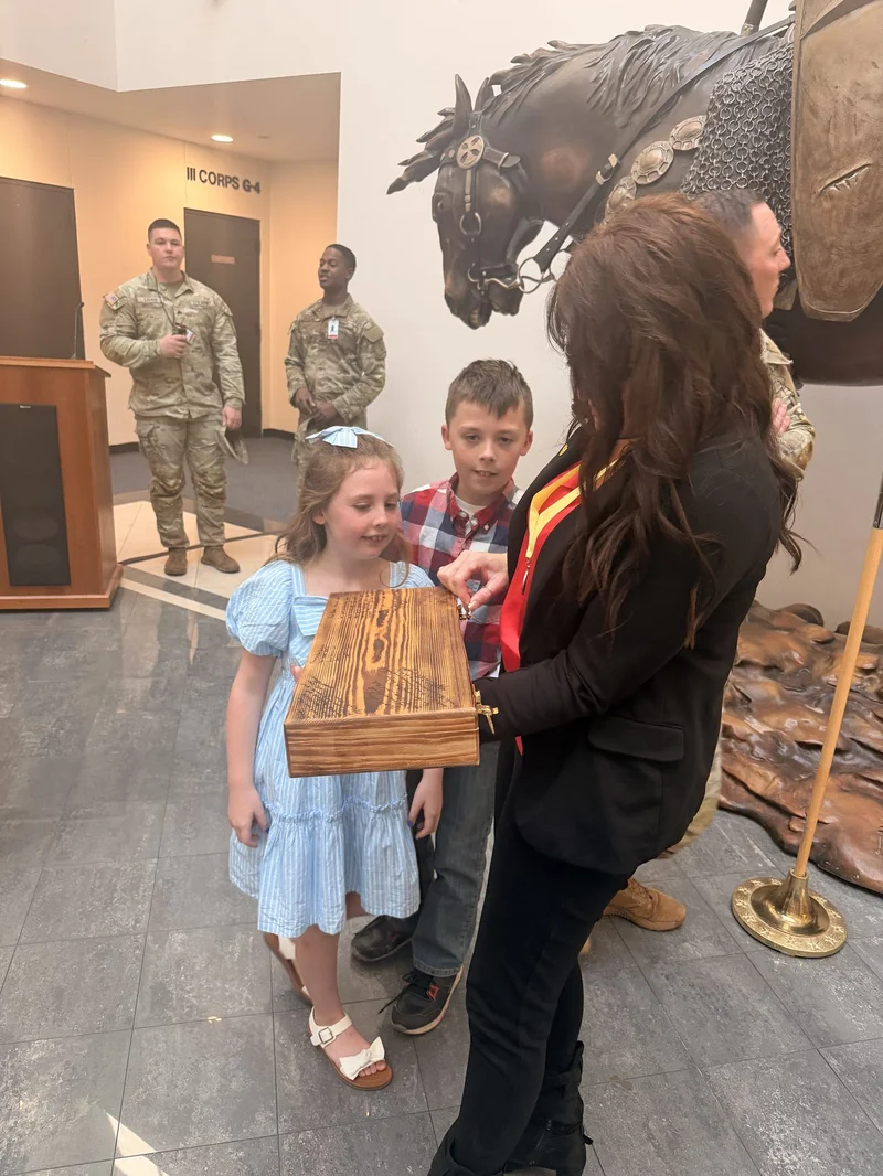 Weicht family checking out the personalized gift
